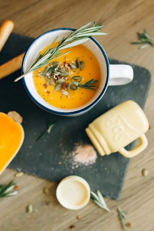 Ginger_Pumpkin_Soup_with_Lentils_Spicy_Soup_Delicious_Pumpkin_Flavor_Healthy_Bowl_Nutritious_Veggie_Soup_Lentil_Addition_Aromatic_Spices_Satisfying_Soup_Homemade_Goodness_Wholesome_Dish_Ayurvedic_Food_Ayurveda